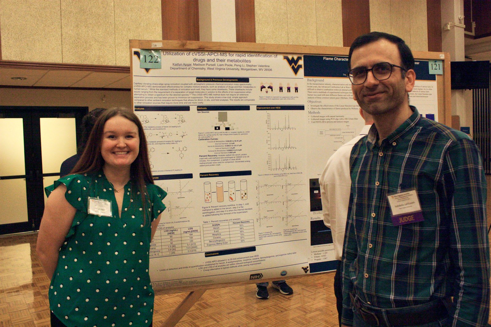 Habib Latifizadeh judging a student chemistry research poster at the WVU Undergraduate Research Symposium, 2023